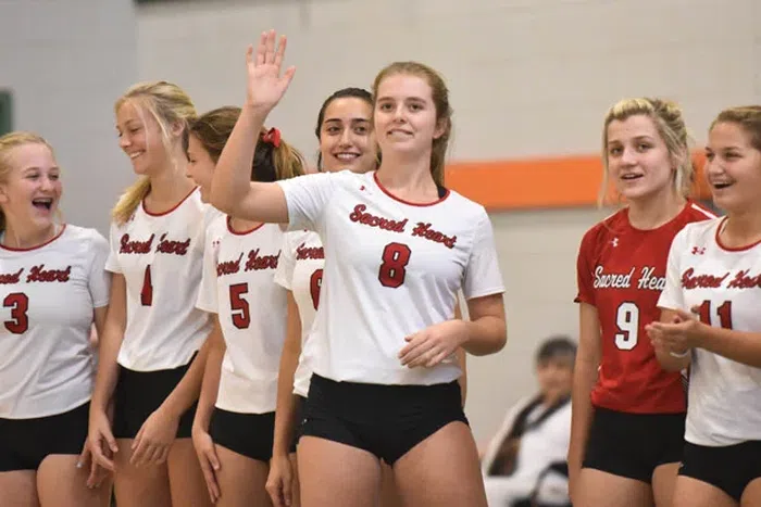May Manning (centre), niece of NFL legend Peyton Manning