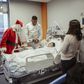 Nigeria-born boxer Anthony Joshua and Father Christmas visit to give gifts to kids at Watford hospital.