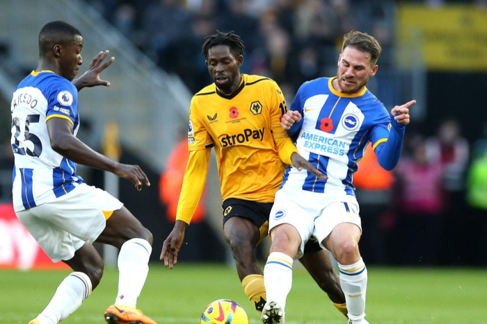 Wolverhampton Wanderers Boubacar Traore (centre) battle for the ball with Brighton and Hove Albion s Moises Caicedo (left) and Alexis Mac Allister