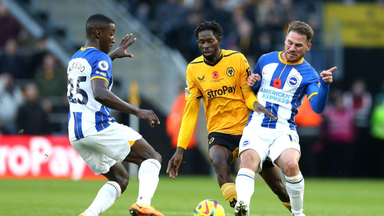 Wolverhampton Wanderers Boubacar Traore (centre) battle for the ball with Brighton and Hove Albion s Moises Caicedo (left) and Alexis Mac Allister