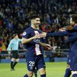 Lionel Messi celebrates with teammates after scoring for PSG against Lens