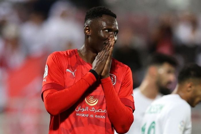 Michael Olunga with hands on his mouth after missing a chance.
