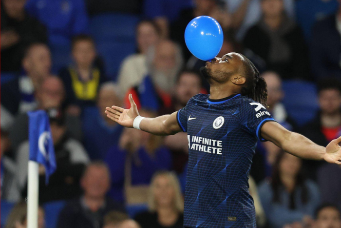 Christopher Nkunku of Chelsea celebrates after scoring to make it 2-0 during the Premier League match at the AMEX Stadium, Brighton and Hove. || Image credit: Imago