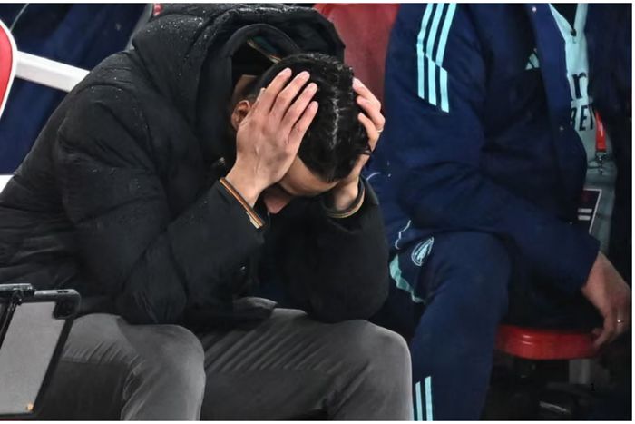 Ruben Amorim holds his head in frustration. Photograph: Dylan Martinez/Reuters