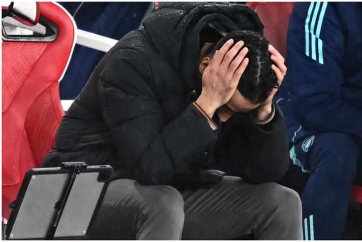 Ruben Amorim holds his head in frustration. Photograph: Dylan Martinez/Reuters
