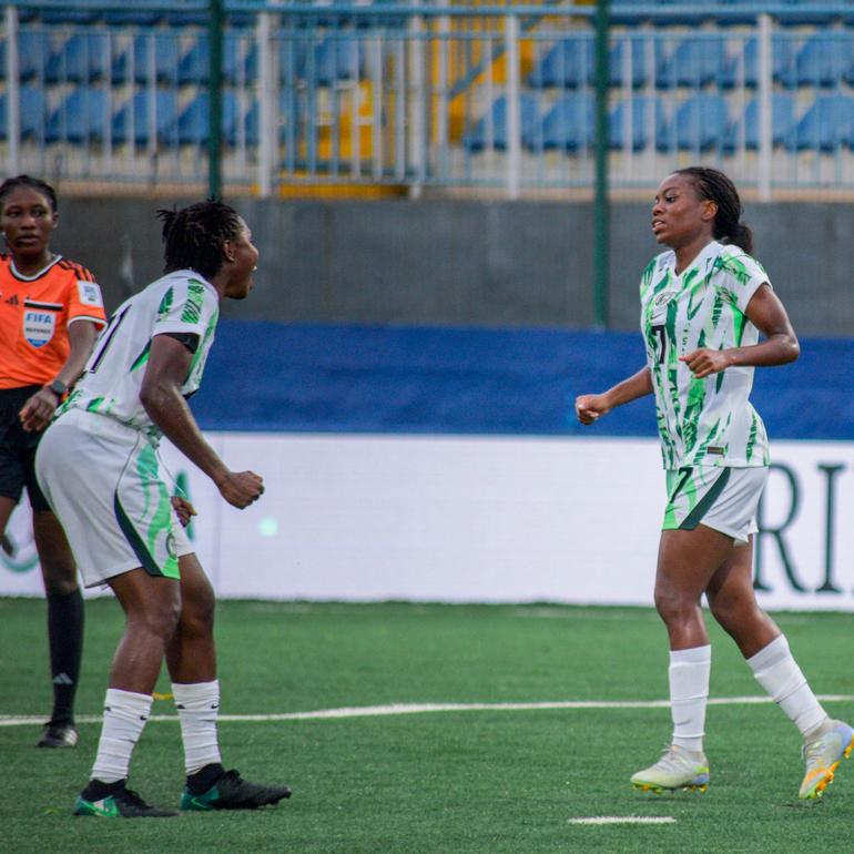 Monday Gift and Tony Payne celebrate against Comoros.