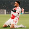 Ajax hero Chuba Akpom celebrates against Athens.