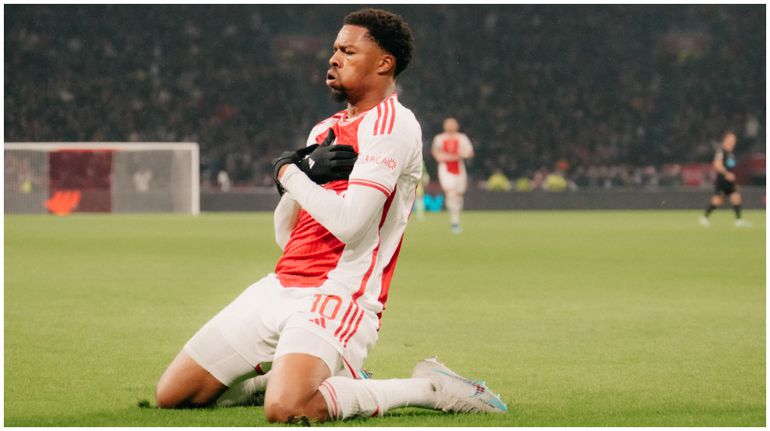 Ajax hero Chuba Akpom celebrates against Athens.
