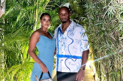 Asafa Powell and wife serve couple goals as they grace a friend's wedding