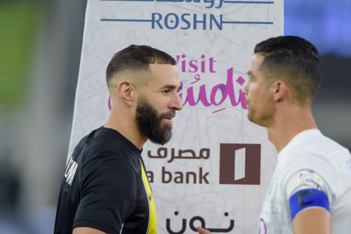 Karim Benzema of Al-Ittihad and Cristiano Ronaldo of Al Nassr shaking hands before the Saudi Pro League match between Al-Ittihad and Al-Nassr at Prince Abdullah Al Faisal Stadium || Image credit: Imago