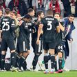 Juventus ease past 10-man Freiburg into quarter-finals