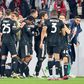 Juventus ease past 10-man Freiburg into quarter-finals