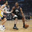 Steph Curry defends against Los Angeles' Clippers star Kahwi Leonard