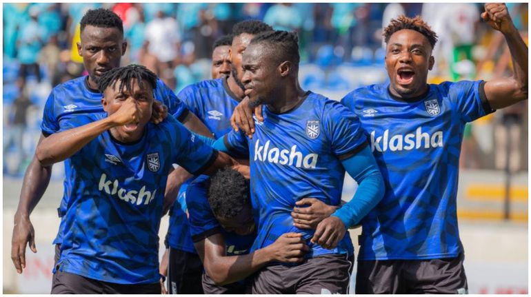 Junior Lokosa leads celebrations for Sporting Lagos.