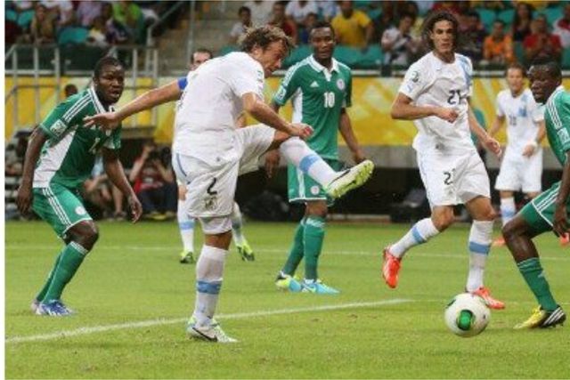 Uruguay's skipper Diego Lugano opens the scoring against Nigeria 12 years ago at the FIFA Confederations Cup.
