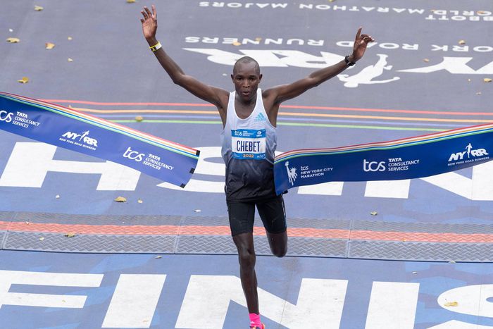Evans Chebet cuts the tape at the 2022 New York City Marathon