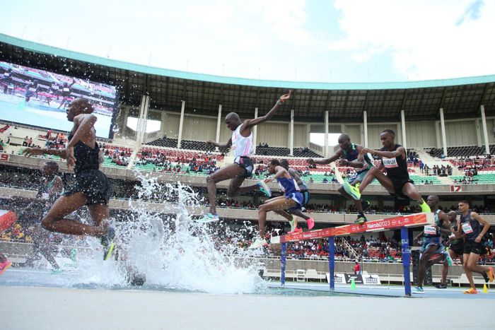 Amos Kirui jumps a barrier (far left) during the Kip Keino Classic