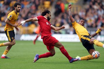 Liverpool leave it late to down Wolves as Salah reaches Steven Gerrard milestone