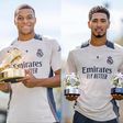Real Madrid stars Kylian Mbappe, Jude Bellingham and Vinicius Junior celebrate Champions League awards.