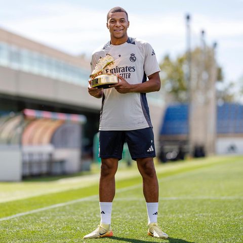 Real Madrid stars Kylian Mbappe, Jude Bellingham and Vinicius Junior celebrate Champions League awards.