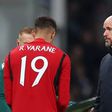 Manchester United boss Erik ten Hag and defender Raphael Varane || Getty Images
