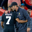Liverpool s manager Jurgen Klopp (R) embraces Paris Saint-Germain s Kylian Mbappe after the UEFA Champions League Group C match between Liverpool and Paris Saint-Germain at Anfield Stadium in Liverpool, Britain on Sept. 18, 2018. || Image credit: Imago