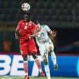 Kenya’s Eric Johana challenges Selmane Bensebaini of Algeria during the 2019 Afcon finals.