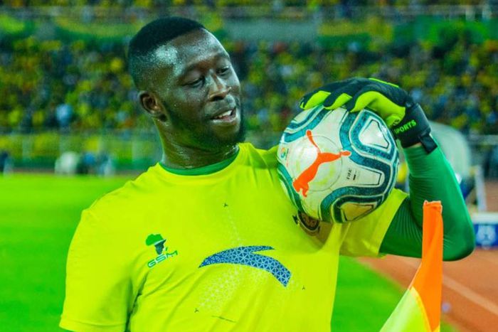 Farouk Shikalo holding a ball on his chest.