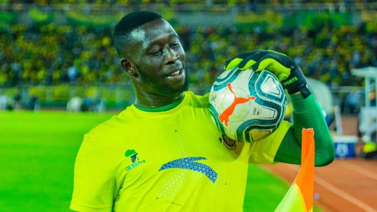 Farouk Shikalo holding a ball on his chest.