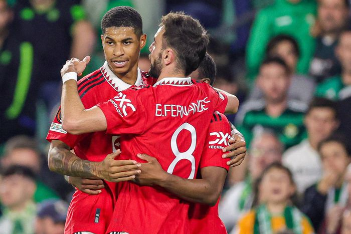 Manchester United's Marcus Rashford celebrates a goal with Bruno Fernandes during the Europa League match against Real Betis.