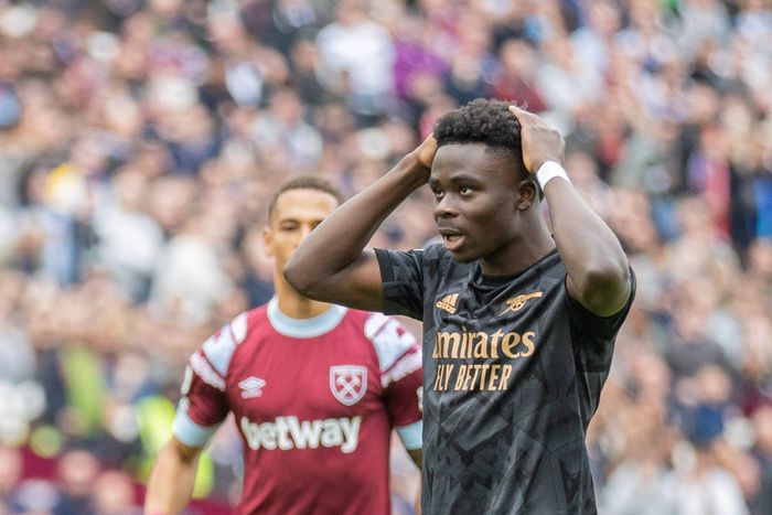Bukayo Saka reacts after missing a penalty against West Ham.