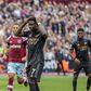 Arsenal's Bukayo Saka reacts after missing a penalty vs West Ham United.