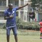 Coach Kimani issuing instructions during training