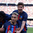 Jules Kounde, Raphinha and Sergi Roberto celebrating a goal