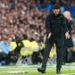 Arsenal manager visibly frustrated on the touch-line against Real Madrid.
