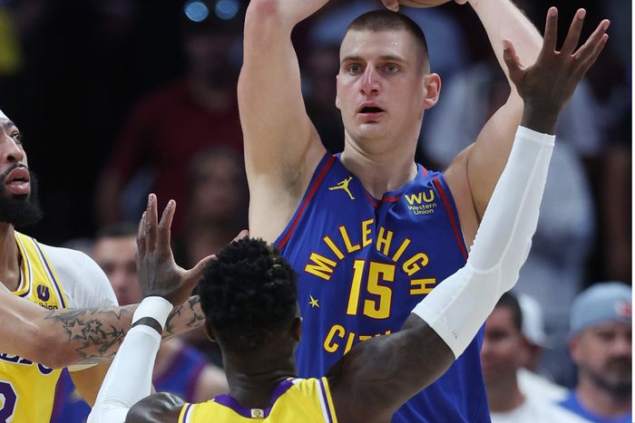 Nikola Jokic alternated between directing the offense, going for rebounds in the paint, and attacking the rim.