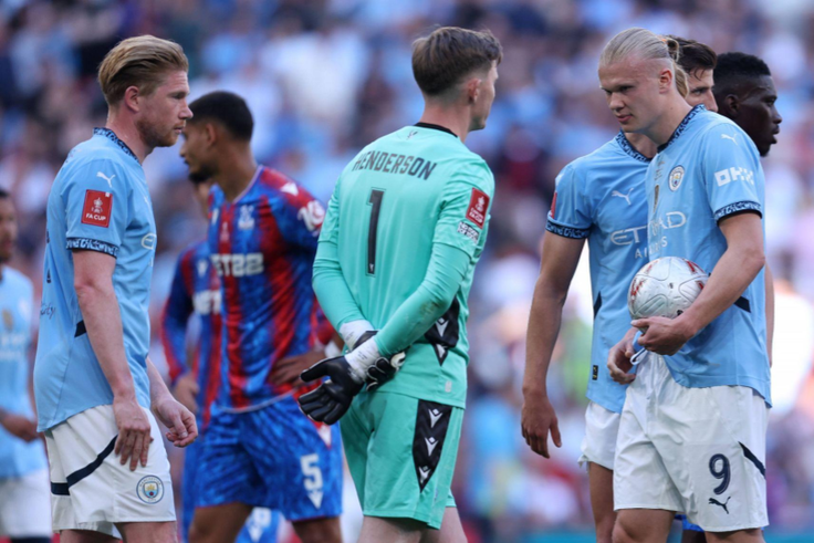 London, England, 17th May 2025. Erling Haaland of Manchester City looks at Dean Henderson of Crystal Palace || Image credit: Paul Terry