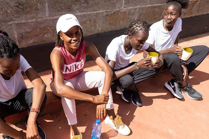 Lynn Ngugi with some of the girls from the camp