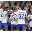 France escape with narrow win