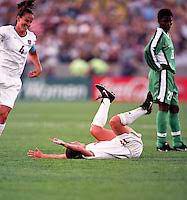 USA's Millbert (centre) scored a brace in a 7-1 demolition of Nigeria in 1999