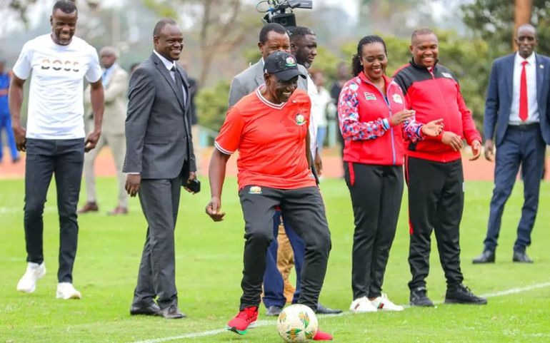 Harambee Stars coach Benni McCarthy and President William Ruto.