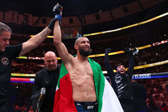 Khamzat Chimaev takes a decision win against Dricus Du Plessis to win the UFC middleweight title at UFC 319 in Chicago.