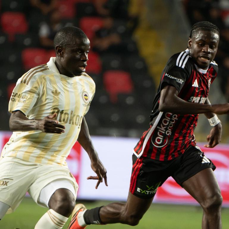 N'Golo Kante (left) and Gidado during the game.