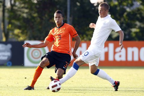 Troost Ekong and Harry Kane squaringgg up in a youth game || Image credit: Imago