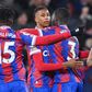 Michael Olise celebrates with teammates after his stunning equaliser for Crystal Palace against Manchester United