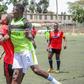Kayole Starlets in action against Falling Waters Barcelona FC at the Camp Toyoyo Grounds.