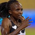 Hellen Obiri sprinting towards the finish line.