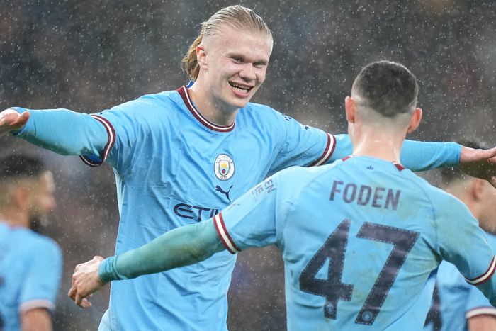 Manchester City's Erling Haaland and Phil Foden celebrate a goal