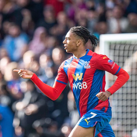 Michael Olise celebrates scoring for Crystal Palace