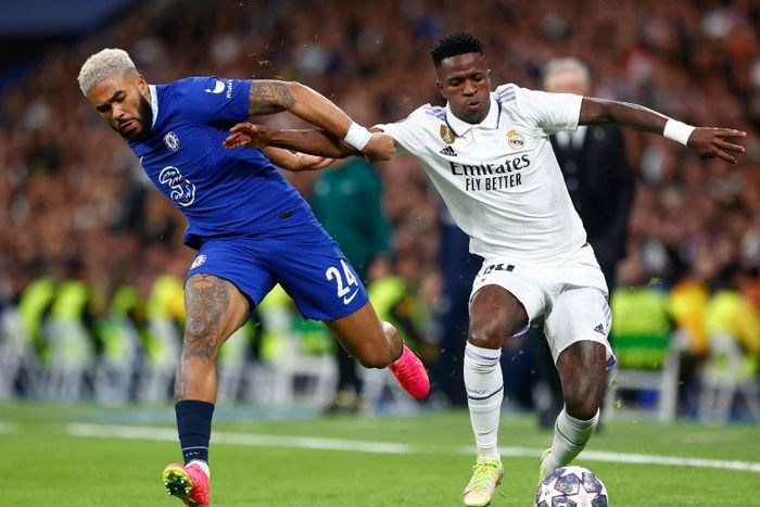 Reece James of Chelsea FC and Vinicius Junior of Real Madrid CF during the UEFA Champions League match between Real Madrid and Chelsea FC played at Santiago Bernabeu Stadium.